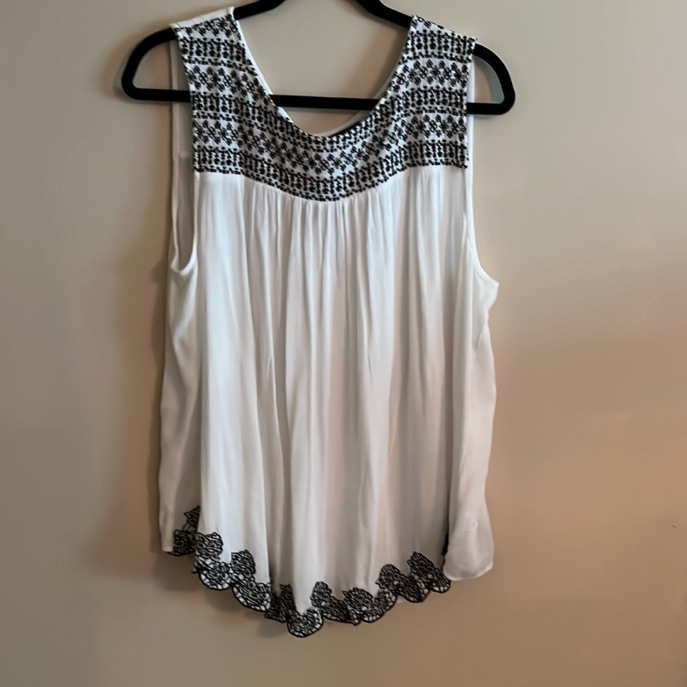 Cool summery blouse.  Size 2x. Embroidery detail at neck at front hem